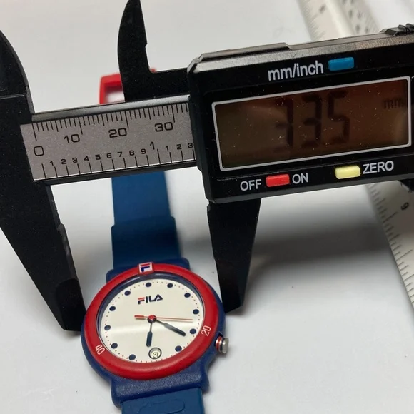 Fila vintage 95M watch, red white blue, new battery, rubber strap, date feature